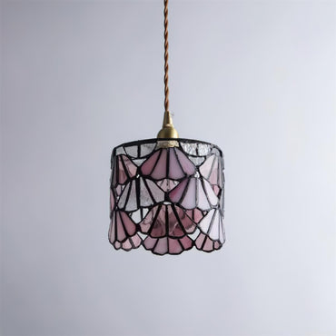 Pendant Light With Brass Accents And Glass Shade For Warm Glow