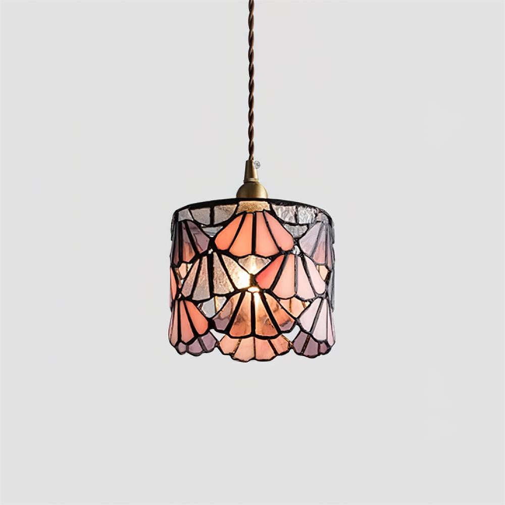 Pendant Light With Brass Accents And Glass Shade For Warm Glow