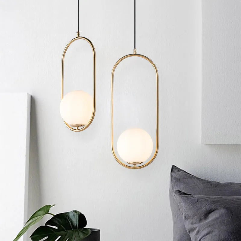 Gold And Black Frame With Oval Globe Pendant Light