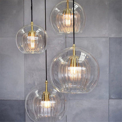Modern Ambience Clear Or Amber Glass Globe Pendant Light