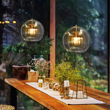 Modern Ambience Clear Or Amber Glass Globe Pendant Light