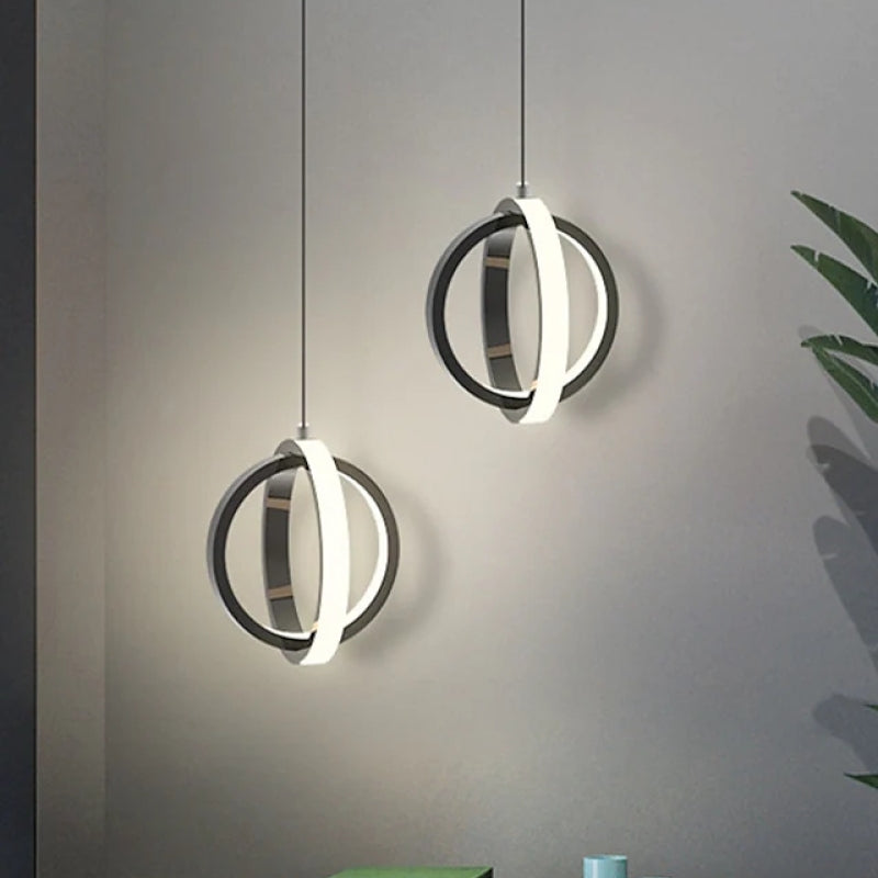Spherical Black And Gold Pendant Light With Soft Glow
