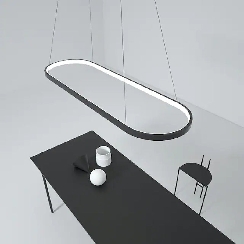 Minimalist Oval Pendant Light Featuring Warm Glow
