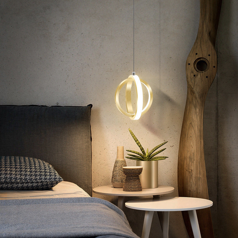 Spherical Black And Gold Pendant Light With Soft Glow