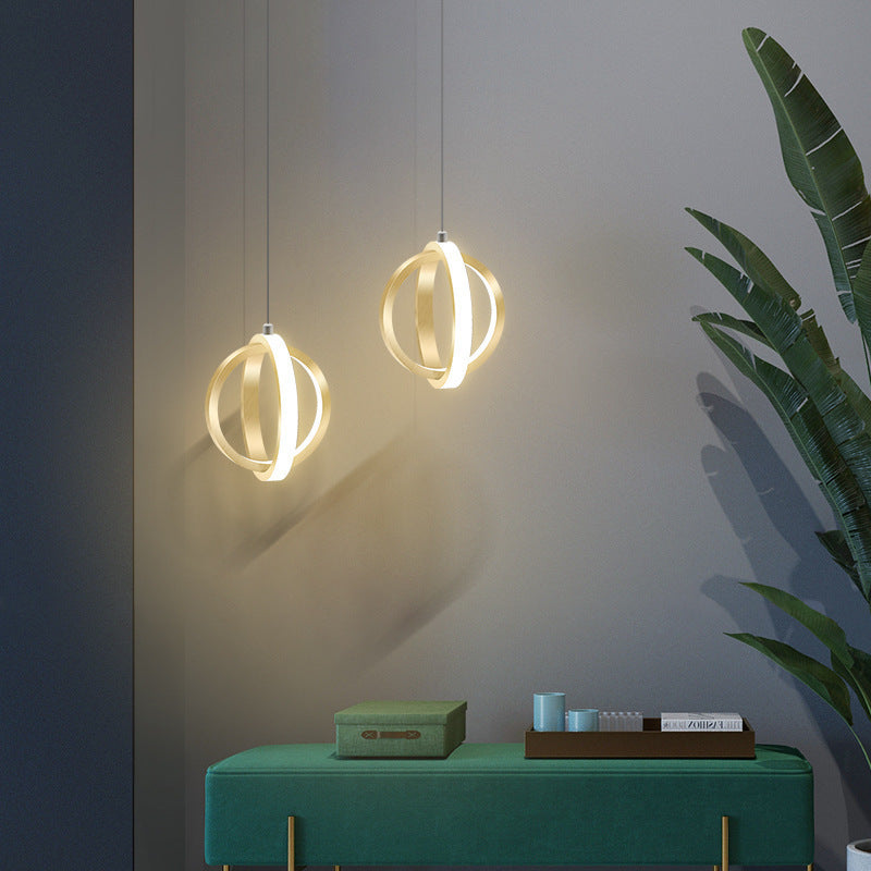 Spherical Black And Gold Pendant Light With Soft Glow