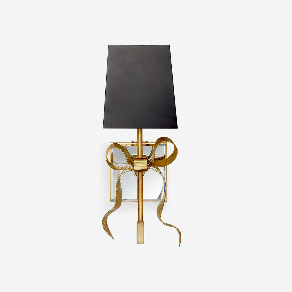 Wall Light With Brass Bow Accent And Noir Fabric Shade