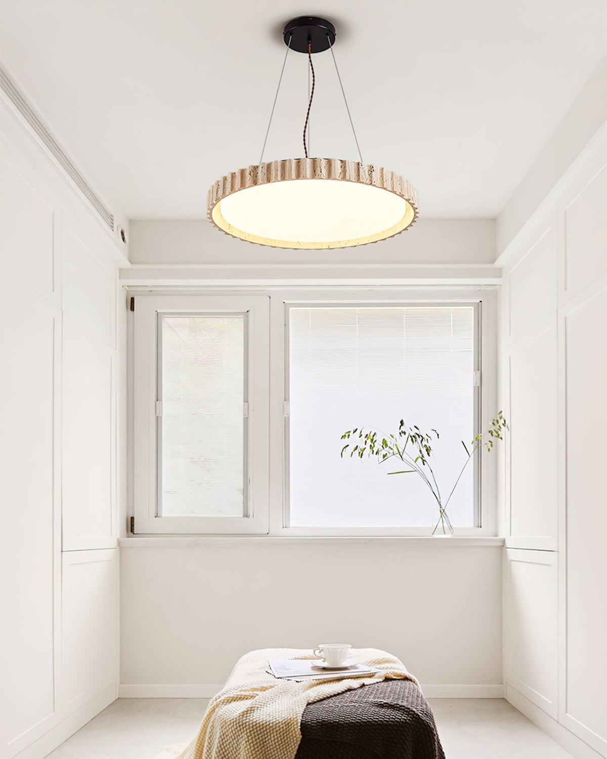 Circular Travertine Pendant Light With Warm Glow