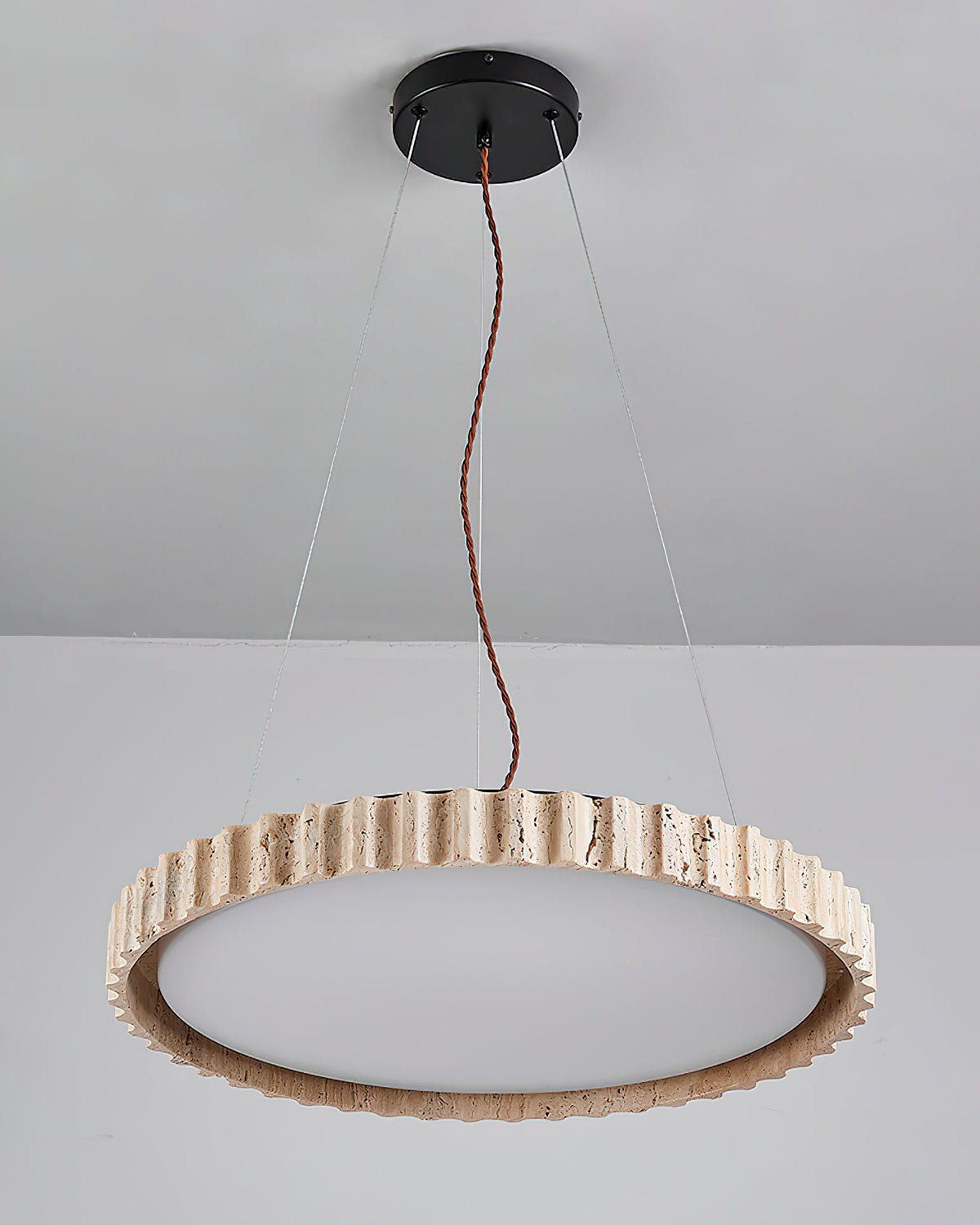 Circular Travertine Pendant Light With Warm Glow