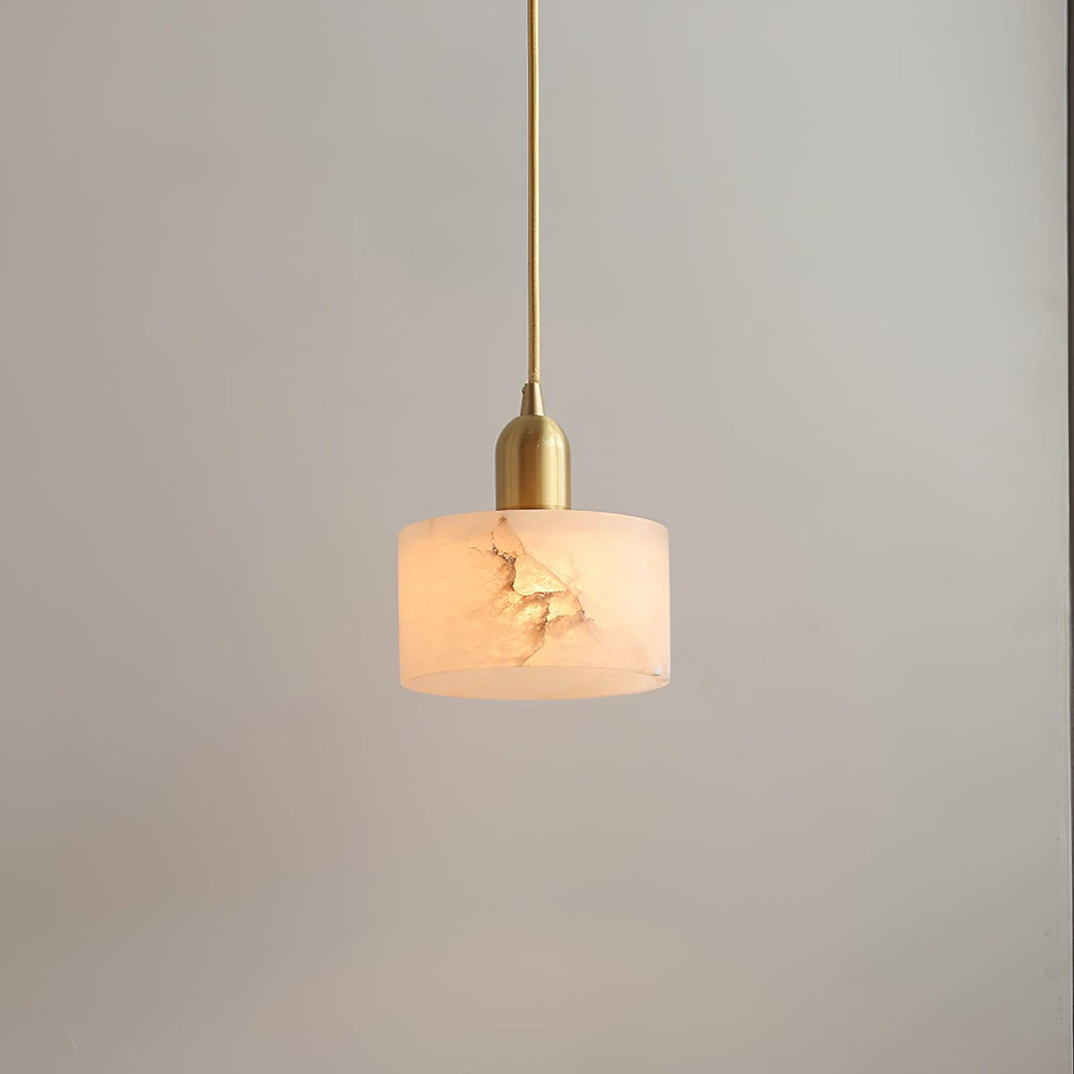 Warm Glow Alabaster Pendant Light With Brass Accent