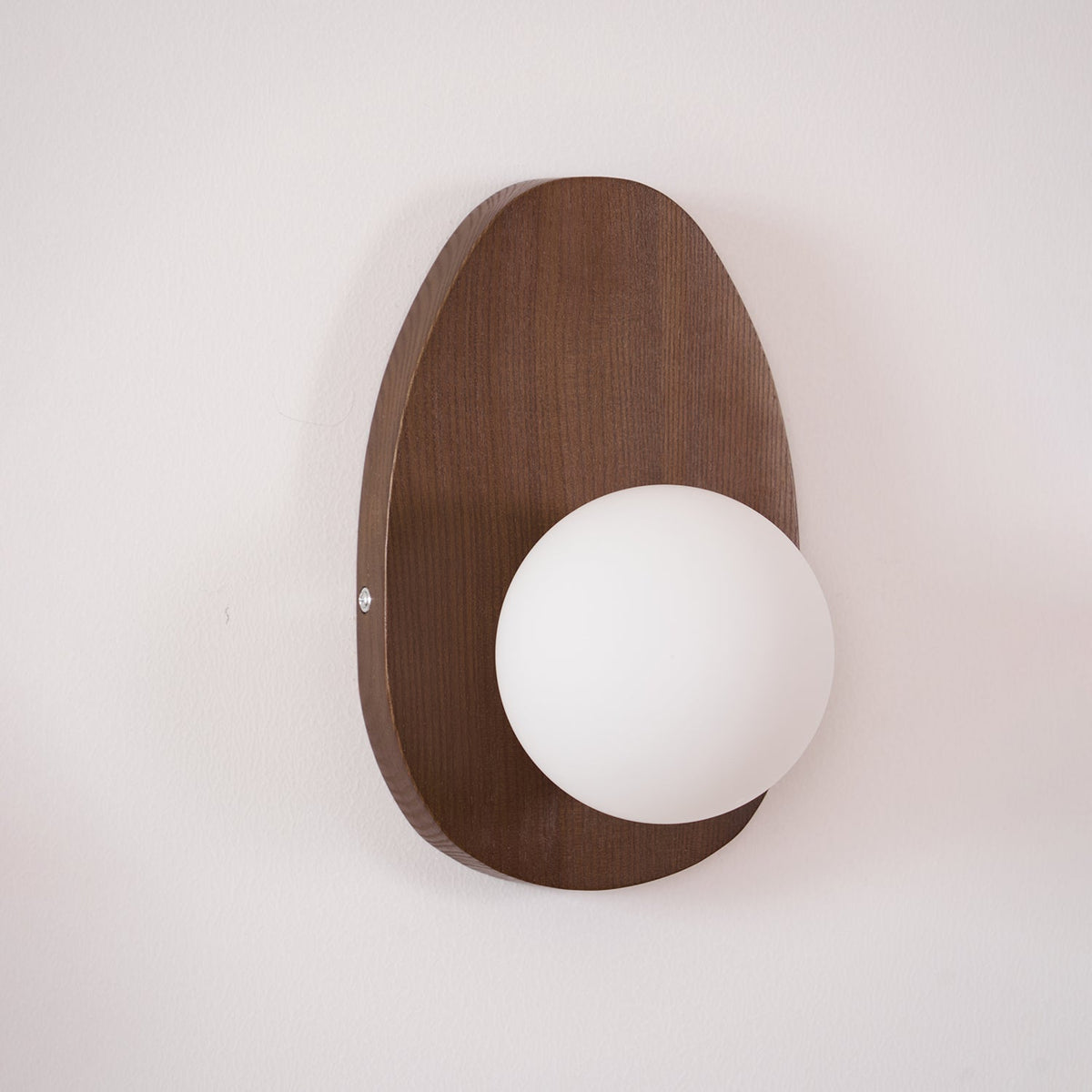 Globe Shade And Walnut Base Wall Lamp With Pebble Glow