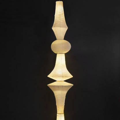 Vertical Sculptural Pendant Light With Warm Paper Glow