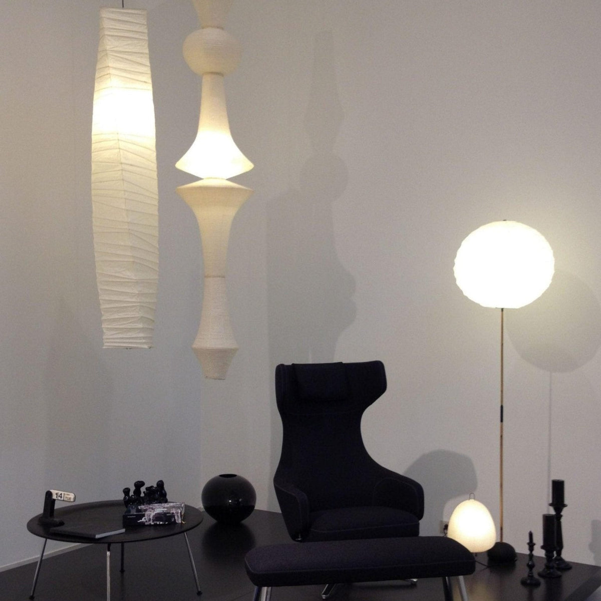 Vertical Sculptural Pendant Light With Warm Paper Glow