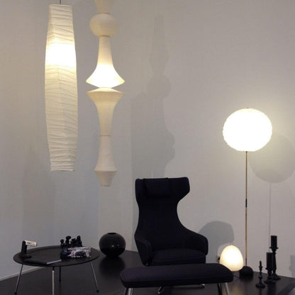 Vertical Sculptural Pendant Light With Warm Paper Glow