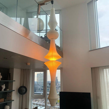 Vertical Sculptural Pendant Light With Warm Paper Glow