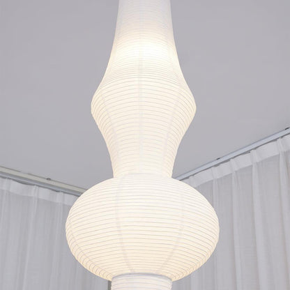 Vertical Sculptural Pendant Light With Warm Paper Glow