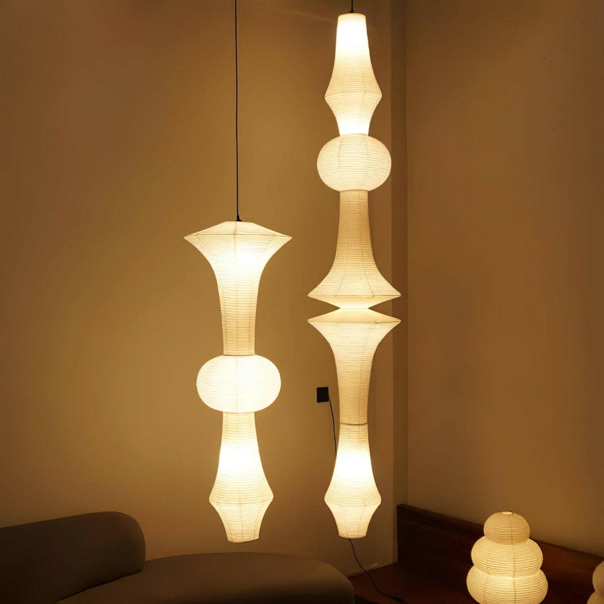Vertical Sculptural Pendant Light With Warm Paper Glow