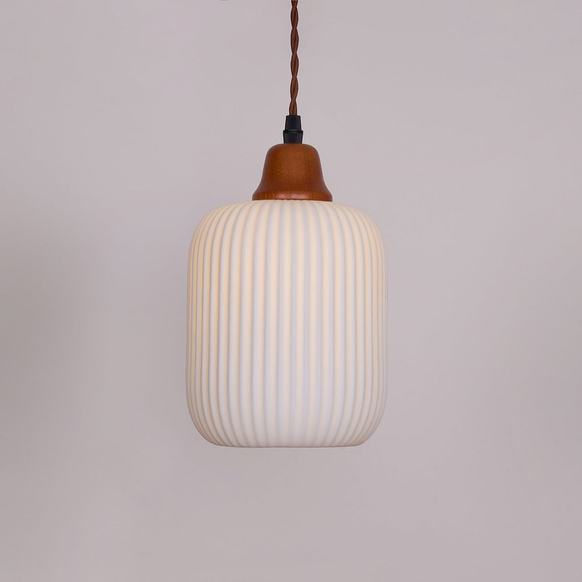 Ceramic Globe Pendant Light With Warm Glow