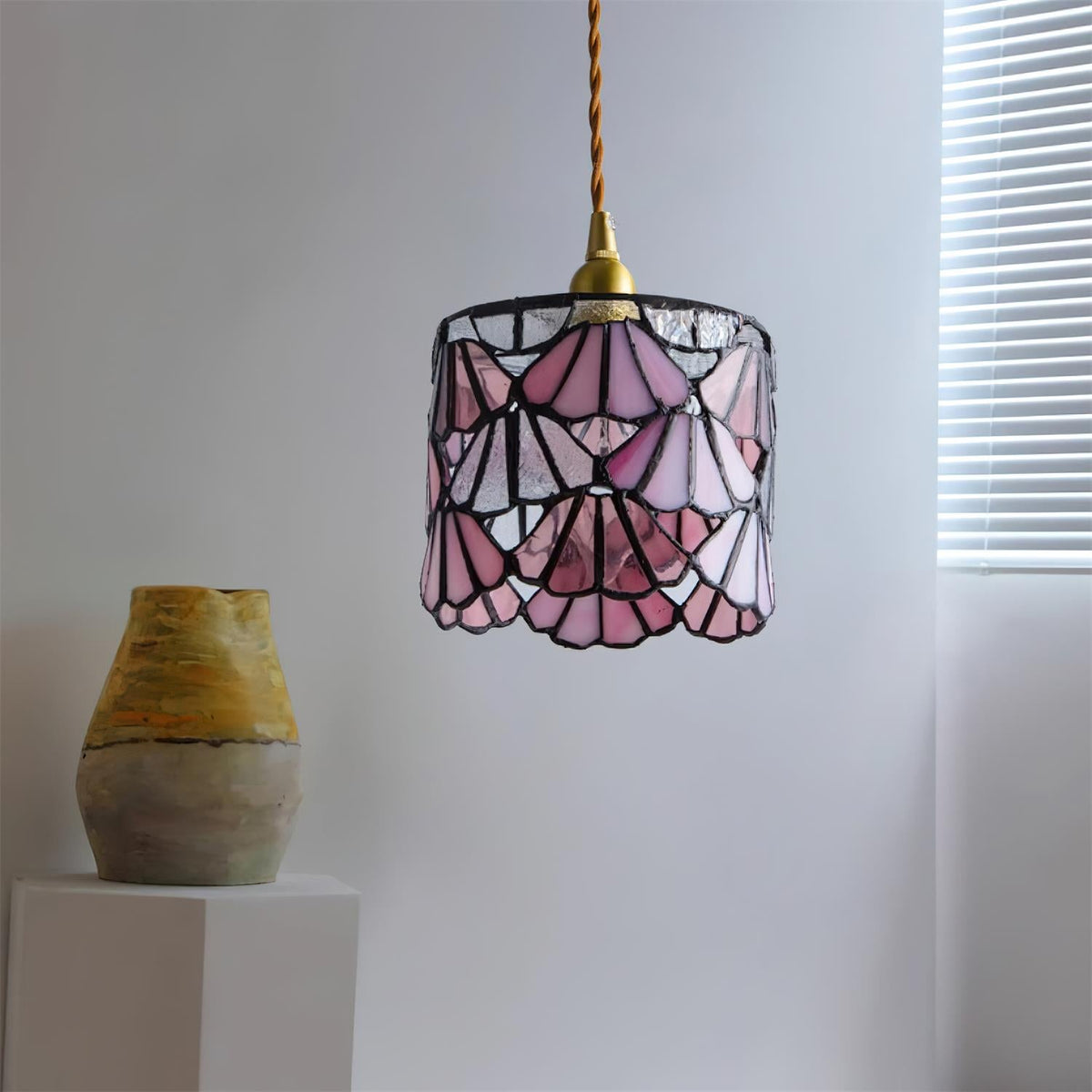 Pendant Light With Brass Accents And Glass Shade For Warm Glow