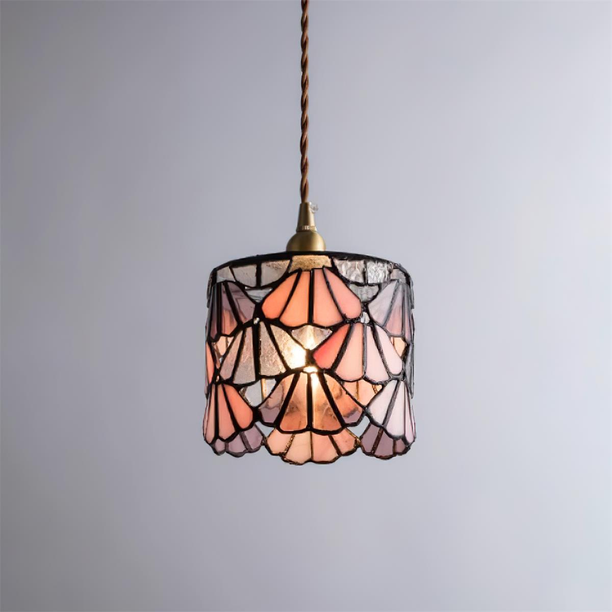 Pendant Light With Brass Accents And Glass Shade For Warm Glow