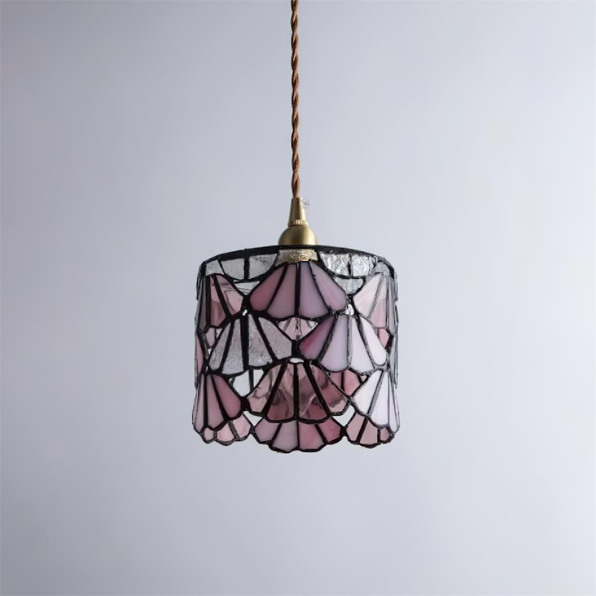 Pendant Light With Brass Accents And Glass Shade For Warm Glow