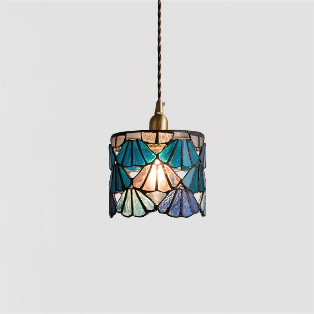 Pendant Light With Brass Accents And Glass Shade For Warm Glow