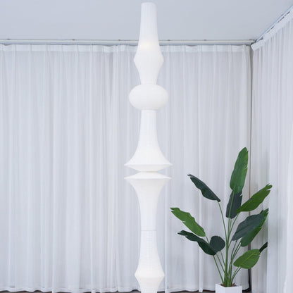 Vertical Sculptural Pendant Light With Warm Paper Glow