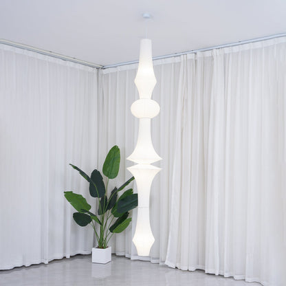 Vertical Sculptural Pendant Light With Warm Paper Glow