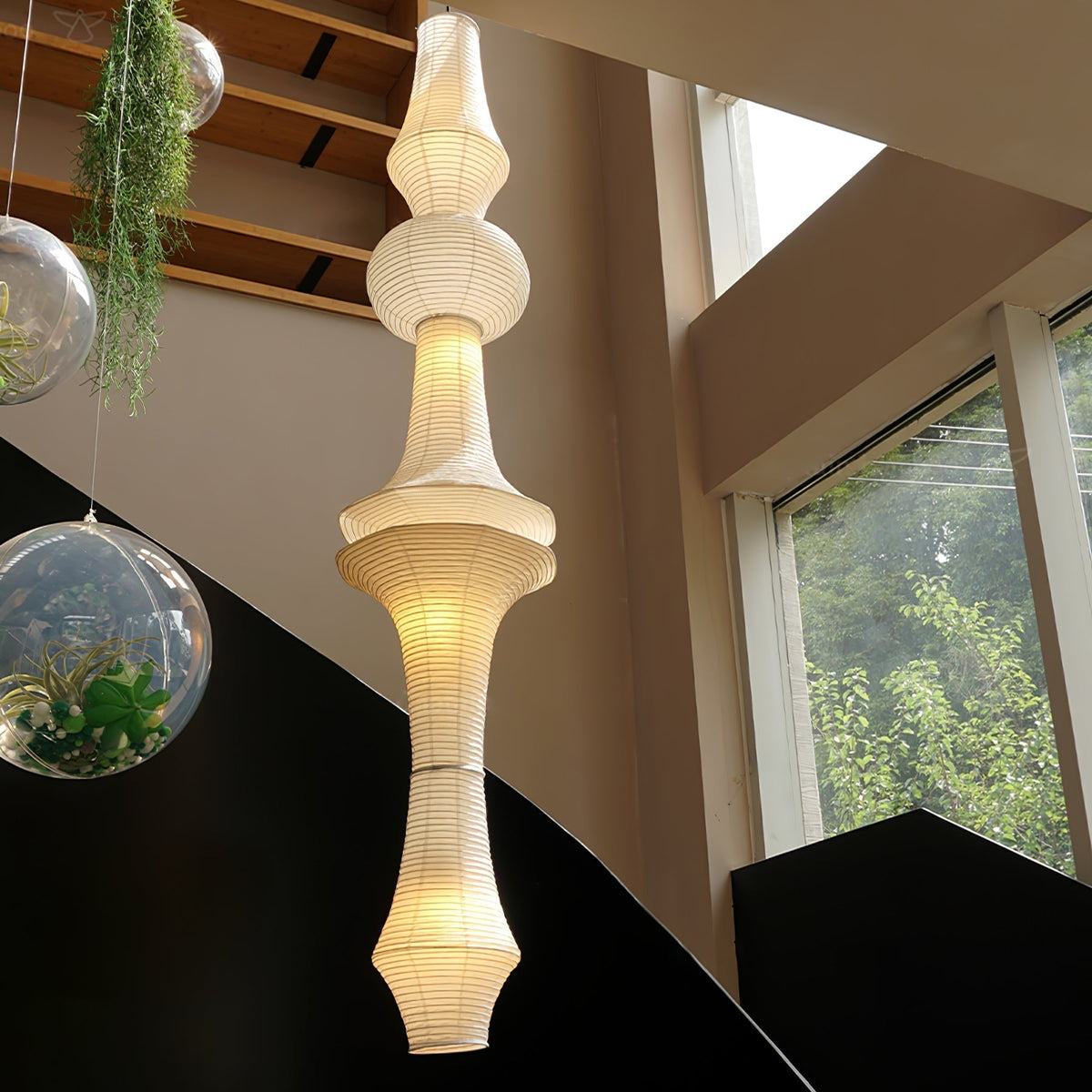 Vertical Sculptural Pendant Light With Warm Paper Glow