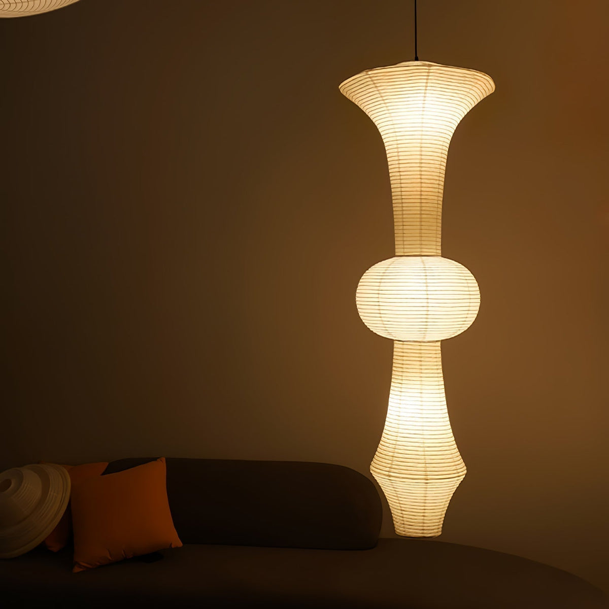 Vertical Sculptural Pendant Light With Warm Paper Glow