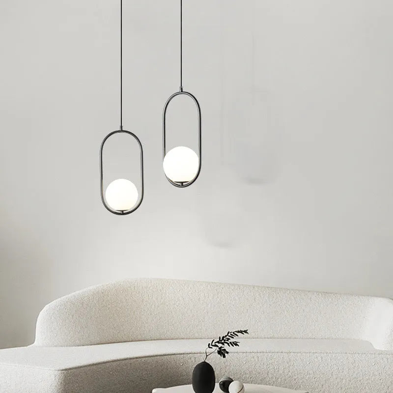 Gold And Black Frame With Oval Globe Pendant Light